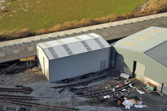 Aerial shot of completed building in train yard